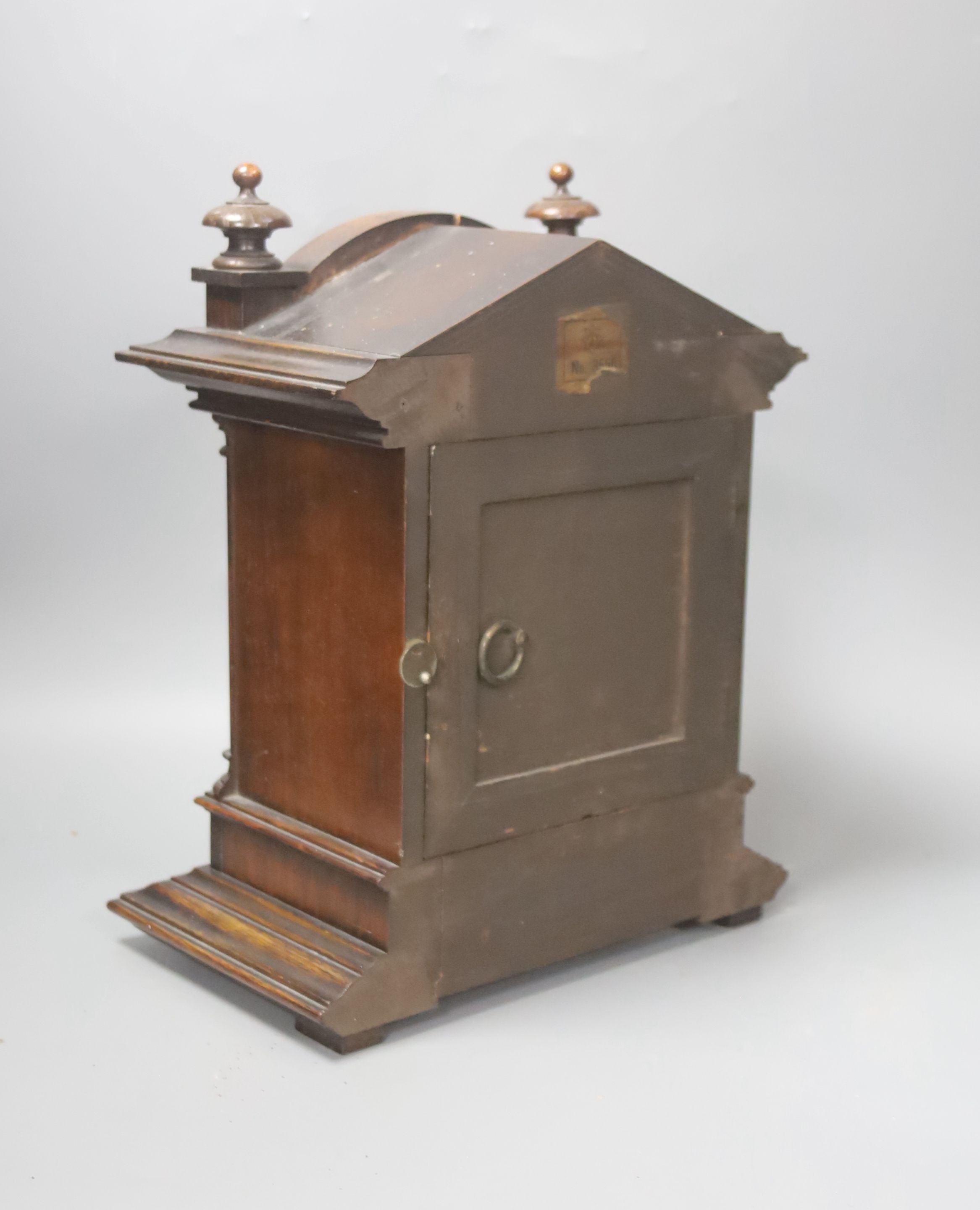 A Late 19th century German walnut mantel clock, 34cm